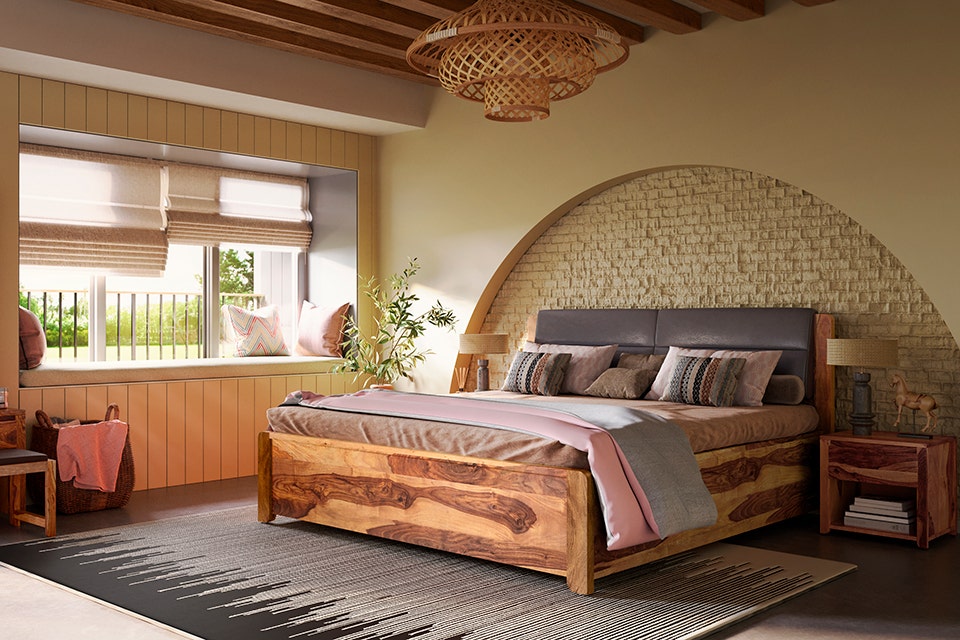 A bedroom with a bed and a window.