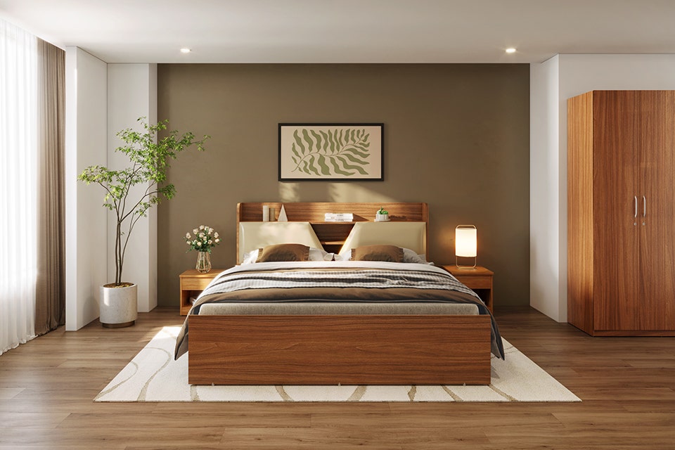 A bedroom with a bed and a chandelier.