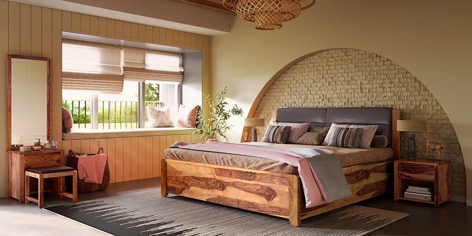 A rustic bedroom set with a warm rug and bamboo window curtains to complete the look.