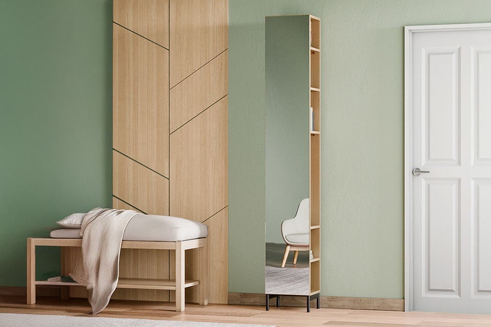 Contemporary entryway featuring a shoe cabinet, bench and wall organiser.