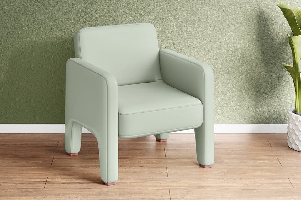 Comfortable single-seater sofa placed in a stylish kids’ bedroom reading corner.