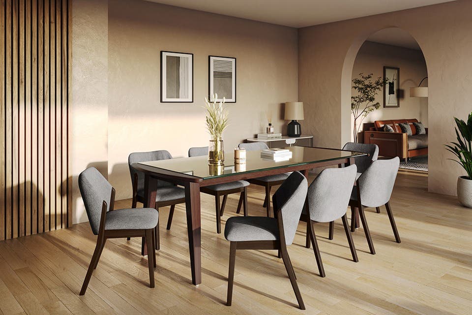 Glass-top dining table in a contemporary dining space.