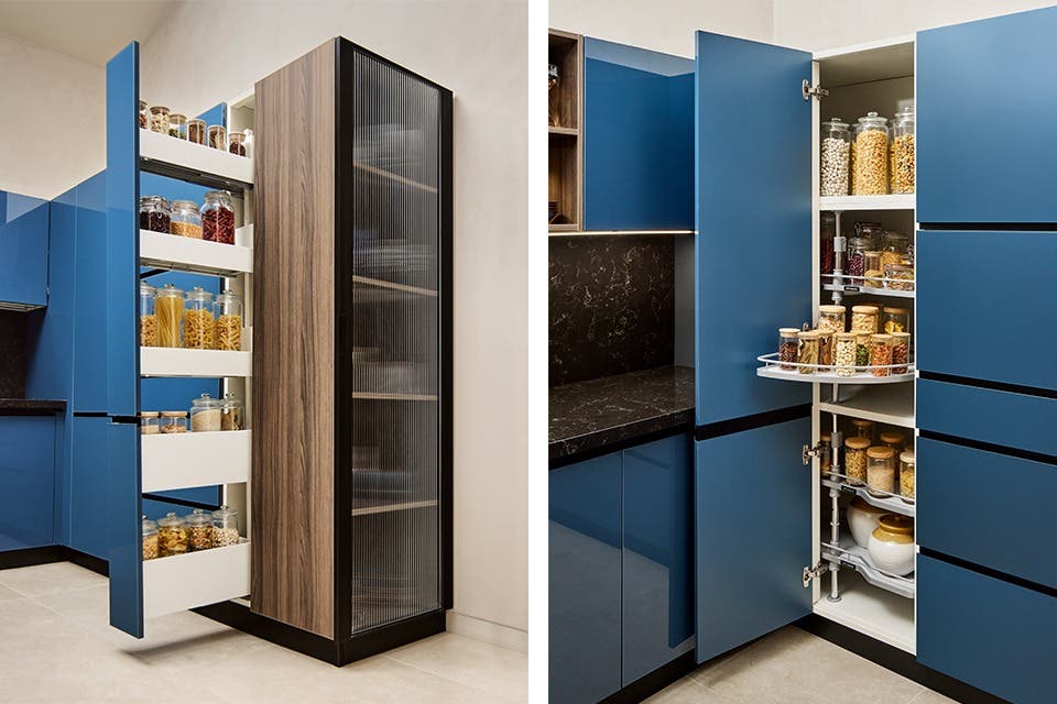 Contemporary modular kitchen with floor-to-ceiling cabinets and full-height pantry storage.