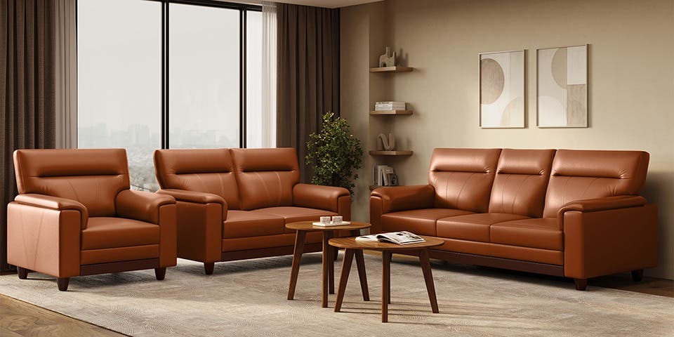 Leather sofa with wooden armrests in a contemporary living room.