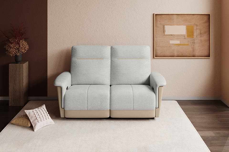 TuneIn motorised two-seater recliner sofa set in a modern home setting.