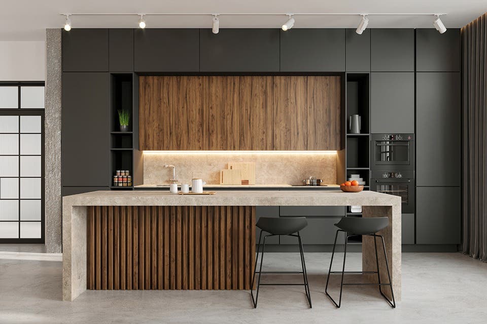 An island kitchen with a counter table and stools.