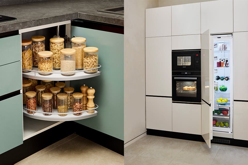 Kitchen storage with corner cabinets and in-built refrigerator, oven and microwave.