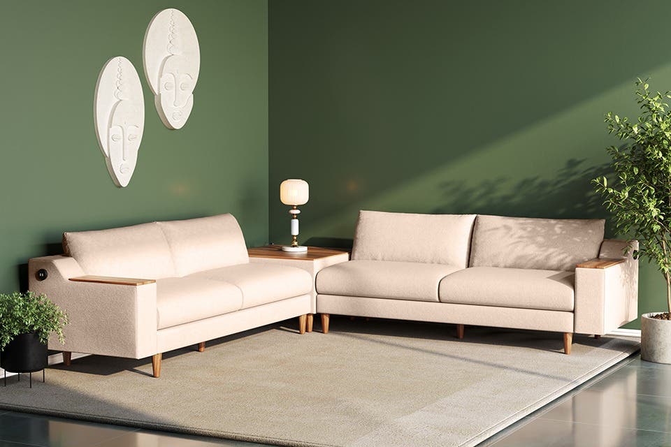 Beige and wooden sofa against a clean, organic setting, creating a well-balanced living room.