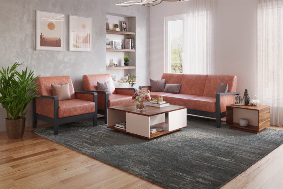 Rustic orange sofa with wooden accents in a contemporary living room.
