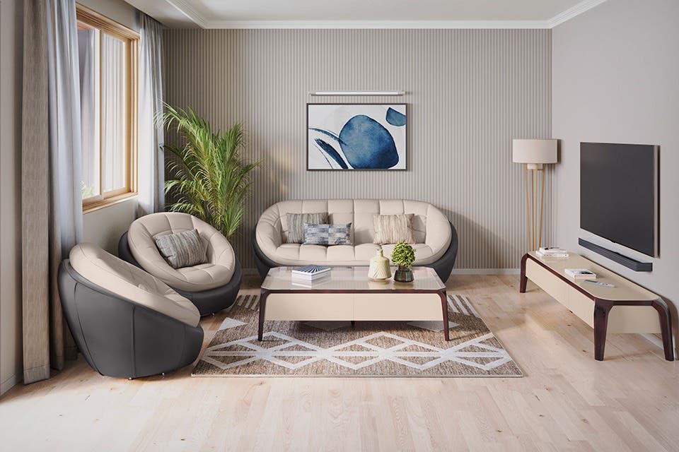 Beige and black Opulent sofa set from Interio by Godrej in a contemporary living room.