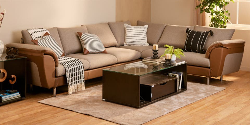 L-shaped sofa positioned neatly in the corner of a contemporary living room.