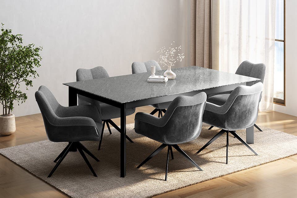 Luxus 68 dining chair by Interio featuring a slim metal frame and upholstered seat. 